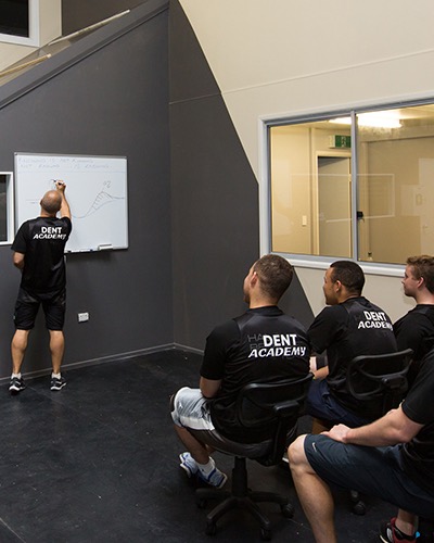 Instructing a team of The Dent Academy students