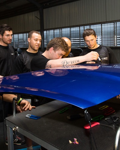 John Ashton repairing a hail damaged vehicle